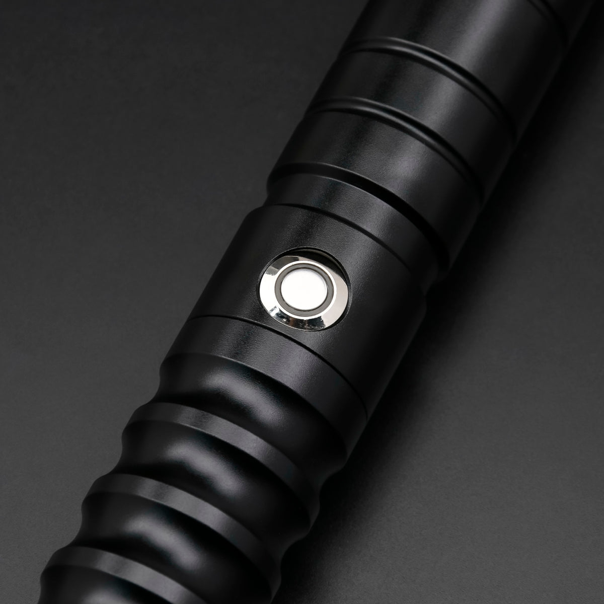 Black Starter Saber — button detail