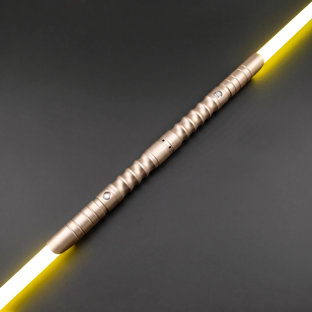 Gold Starter Saberstaff — connected, blade toward upper right