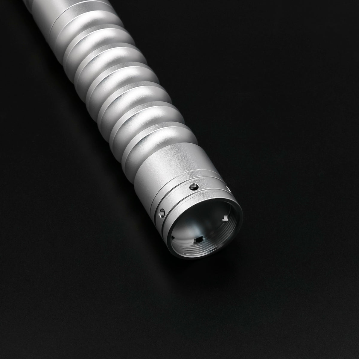 Silver Starter Saber — pommel detail